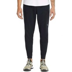 Spodnie męskie Puma Run Tapered Woven Pant. Czarne spodnie sportowe męskie Puma, m, bez wzorów, z materiału, na fitness i siłownię. Za 178.56 zł.