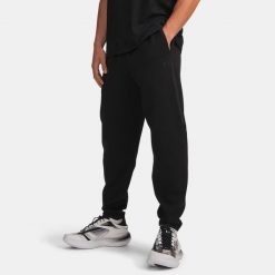 UA Unstoppable Fleece Męskie Spodnie Dresowe Czarne. Czarne spodnie sportowe męskie Under Armour, m, bez wzorów, z dresówki, na fitness i siłownię. Za 569.99 zł.