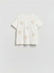 T-shirt z haftowaną aplikacją - złamana biel. T-shirty damskie Reserved, l, z aplikacjami, z bawełny, bez kołnierzyka. Za 79.99 zł.