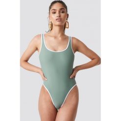 NA-KD Swimwear Kostium kąpielowy z kontrastowym obszyciem - Green. Zielone kostiumy jednoczęściowe damskie NA-KD Swimwear. Za 80.95 zł.