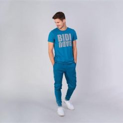 Matu Basic Cuffed Pant - petrol. Niebieskie spodnie sportowe męskie BIDI BADU, m, bez wzorów, z bawełny, tenisowe. W wyprzedaży za 190.20 zł.