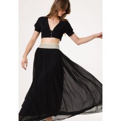 Czarna Spódnica Beholder. Czarne spódnice damskie Born2be, m, z aplikacjami, eleganckie, maxi, dopasowane. Za 39.99 zł.