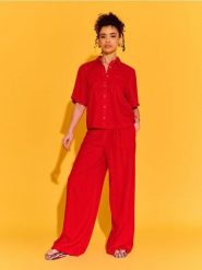 Spodnie wide leg z domieszką lnu - pomarańczowy. Brązowe spodnie materiałowe damskie Sinsay, l, bez wzorów. Za 39.99 zł.