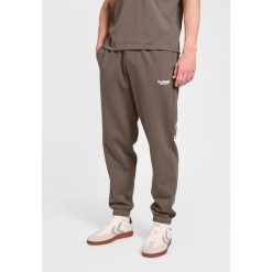 Spodnie do biegania Hummel Legacy 2.0. Niebieskie spodnie sportowe męskie Hummel, na lato, bez wzorów, z dresówki, do biegania. Za 269.50 zł.