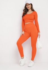 Pomarańczowe Legginsy Push-Up z Prążkowanej Dzianiny Thistleta. Brązowe legginsy damskie Born2be, s, bez wzorów, z dzianiny. Za 34.99 zł.