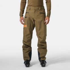 Spodnie narciarskie Helly Hansen Garibaldi 2.0. Brązowe spodnie snowboardowe męskie Helly Hansen, m, bez wzorów, narciarskie. W wyprzedaży za 1,100.50 zł.