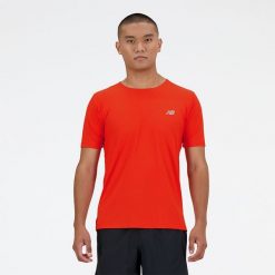 Koszulka męska New Balance MT41281NEF – czerwona. Czerwone koszulki sportowe męskie New Balance, na lato, m, bez wzorów, z materiału, bez kołnierzyka, bez ramiączek, do biegania. Za 99.99 zł.