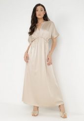 Jasnobeżowa Sukienka Satynowa Alemyllis. Brązowe sukienki damskie Born2be, bez wzorów, z satyny, klasyczne, bez kołnierzyka, bez ramiączek, maxi. Za 29.99 zł.