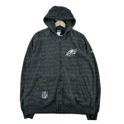 Second life - Kurtka męska Reebok Philadelphia Eagles czarna - Jak nowy. Czarne kurtki męskie Reebok, l, bez wzorów, z materiału, do piłki nożnej. Za 149.06 zł.