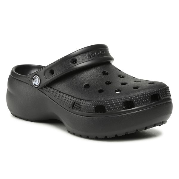 Klapki Crocs. Czarne klapki damskie Crocs, bez wzorów, bez obcasa. Za 202.99 zł.