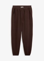 Spodnie dresowe o balonowym kroju. Niebieskie spodnie dresowe damskie bonprix, bez wzorów, z dresówki. Za 54.99 zł.