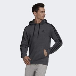 Bluza męska adidas Essentials Fleece 3-Stripes Hoodie. Czarne bluzy męskie Adidas, l, bez wzorów, z polaru, bez kaptura. Za 202.00 zł.