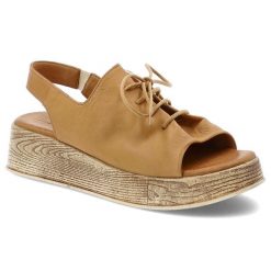 Sandały damskie Artiker, na drewnopodobnej platformie skórzane z wiązaną cholewką wsuwane, brązowe, 56C0287. Brązowe sandały damskie Artiker, bez wzorów, ze skóry, bez obcasa, na koturnie, bez zapięcia. Za 179.00 zł.