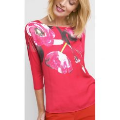 Koszulka bimaterial w kwiaty. Bluzki damskie marki Orsay. Za 69.99 zł.