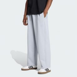 Spodnie z prostymi nogawkami Soft Lux. Szare buty sportowe męskie Adidas, z dzianiny, bez zapięcia, na fitness i siłownię. Za 349.00 zł.