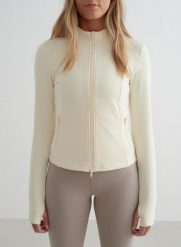Damska kurtka jedwabista, second skin, dwusuwowy zamek Sense migdałowa biel. Białe kurtki damskie Aim'n, xs, bez wzorów, z elastanu, bez kaptura, na jogę i pilates. Za 339.00 zł.