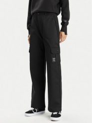 Champion Spodnie dresowe 117201 Czarny Relaxed Fit. Czarne spodnie dresowe damskie Champion, m, bez wzorów, z bawełny. Za 179.99 zł.