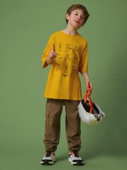 4F T-shirt loose z nadrukiem chłopięcy - żółte 146/152 (10-12 lat). Żółte t-shirty dla chłopców 4f, bez wzorów, z bawełny, bez ramiączek. Za 49.99 zł.