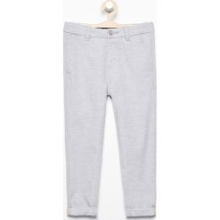 Spodnie chino - Jasny szar. Spodenki niemowlęce marki Reserved. Za 89.99 zł.