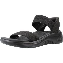 Sandały SKECHERS 140844S Czarny. Czarne sandały damskie Skechers, bez wzorów, z tkaniny, bez obcasa, bez zapięcia. Za 317.99 zł.