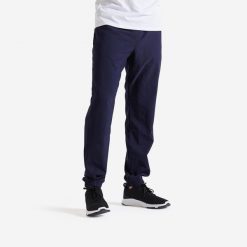 Spodnie fitness męskie Domyos regular. Niebieskie buty sportowe męskie DOMYOS, z materiału, bez zapięcia, na fitness i siłownię. Za 69.99 zł.