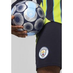 Męskie szorty Manchester City 24/25 PUMA New Navy Blue. Niebieskie krótkie spodenki sportowe męskie Puma, m, bez wzorów, do piłki nożnej. W wyprzedaży za 179.60 zł.