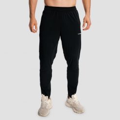 Spodnie męskie do biegania slim czarne Pulse X. Czarne spodnie sportowe męskie GYMBEAM, m, bez wzorów, z elastanu, do biegania. Za 127.90 zł.