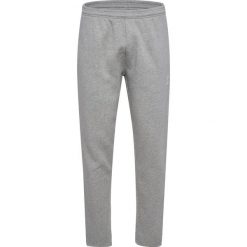 Spodnie dresowe bawełniane Hummel Mover. Szare spodnie sportowe męskie Hummel, bez wzorów, z bawełny, do piłki nożnej. Za 137.50 zł.