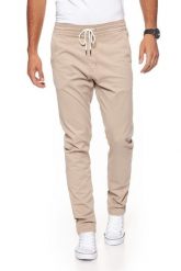 WRANGLER SPODNIE MĘSKIE DRAWSTRING CHINO CAMEL WASHED W16DP749J $. Brązowe spodnie materiałowe męskie Wrangler, l, bez wzorów, z materiału. W wyprzedaży za 131.49 zł.
