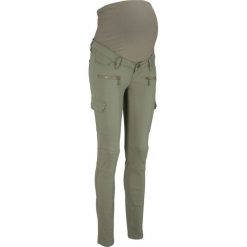 Spodnie ciążowe bojówki SKINNY bonprix oliwkowy. Spodnie materiałowe damskie marki bonprix. Za 54.99 zł.