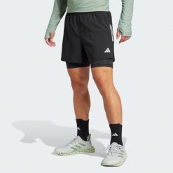 Szorty Own the Run CLIMACOOL 2-in-1. Czarne krótkie spodenki sportowe męskie Adidas, xl, bez wzorów, do biegania, climacool (adidas). W wyprzedaży za 145.27 zł.