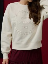 Bluza crewneck oversize z napisem - kremowy. Białe bluzy damskie Sinsay, l, bez wzorów, bez kaptura. Za 45.99 zł.