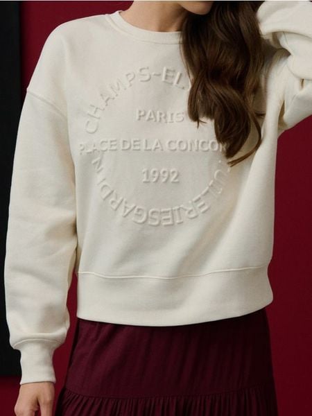 Bluza crewneck oversize z napisem - kremowy. Białe bluzy damskie Sinsay, l, bez wzorów, bez kaptura. Za 45.99 zł.