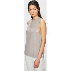 Under Armour - Top. Topy damskie marki Under Armour. Za 89.90 zł.