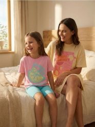 Bawełniana koszula nocna z motywem owocowym - żółty. Żółte koszule nocne damskie Sinsay, l, bez wzorów, z bawełny. Za 29.99 zł.