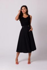 Rozkloszowana spódnica z wysokim stanem i kieszeniami czarna. Czarne spódnice damskie Bewear, na lato, m, bez wzorów, z podwyższonym stanem, midi, rozkloszowane. Za 319.00 zł.