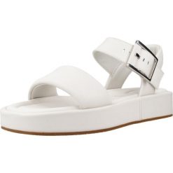 Sandały CLARKS ALDA STRAP Biały. Białe sandały damskie Clarks, bez wzorów, ze skóry, bez obcasa, bez zapięcia. Za 408.99 zł.