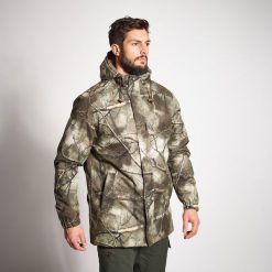 Kurtka myśliwska Solognac Warm 100 wodoodporna camo treemetic. Brązowe kurtki męskie SOLOGNAC, m, bez wzorów, z materiału, sportowe, bez kaptura. Za 299.99 zł.