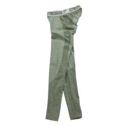 Second life - Spodnie damskie do fitnessu Khaki Flex Gym - Jak nowy. Zielone legginsy sportowe damskie GYMSHARK, bez wzorów, na fitness i siłownię. Za 122.63 zł.