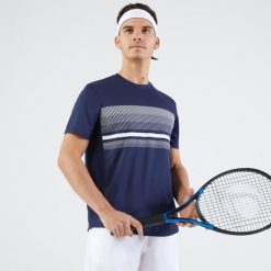 Koszulka do tenisa męska Artengo Essential. Niebieskie koszulki sportowe męskie ARTENGO, l, bez wzorów, z materiału, bez kołnierzyka, bez ramiączek, tenisowe. Za 39.99 zł.