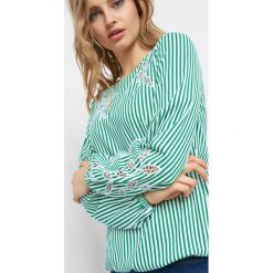 Koszulka w paski z ażurem. T-shirty damskie marki Orsay. W wyprzedaży za 35.00 zł.