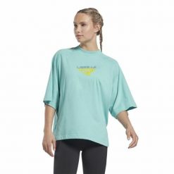 Koszulka z krótkim rękawem Damska Reebok Les Mills®. Koszulki sportowe damskie Reebok, m, bez wzorów, sportowe, bez kołnierzyka. Za 124.00 zł.