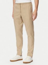 Tommy Hilfiger Chinosy Harlem MW0MW42336 Beżowy Regular Fit. Brązowe eleganckie spodnie męskie Tommy Hilfiger, m, bez wzorów, ze lnu. Za 529.99 zł.