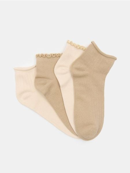 Prążkowane skarpetki 4 pack - wielobarwny. Skarpety damskie Sinsay, bez wzorów, prążkowane. Za 17.99 zł.