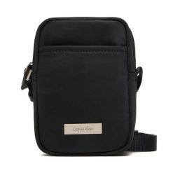 Saszetka Calvin Klein. Czarne saszetki męskie Calvin Klein, młodzieżowe, małe. Za 289.99 zł.