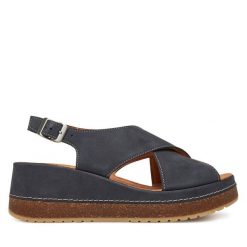 Sandały Clarks. Niebieskie sandały damskie Clarks, bez wzorów, bez obcasa, na koturnie, bez zapięcia. Za 369.99 zł.