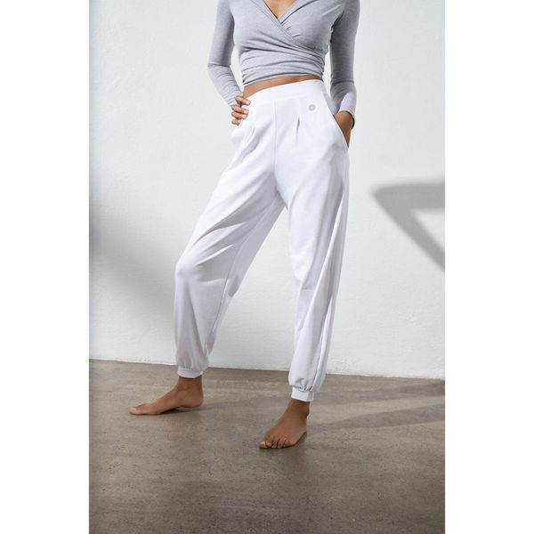 Spodnie do jogi Moonholi Moony Comfy Sweatpants z kieszeniami. Białe spodnie materiałowe damskie MOONHOLI, s, bez wzorów. Za 314.00 zł.