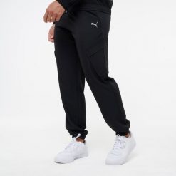 Spodnie dresowe męskie Puma woven. Spodnie sportowe męskie Puma, m, bez wzorów, z dresówki, na fitness i siłownię. Za 219.99 zł.