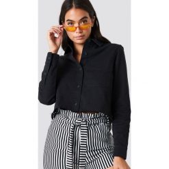 NA-KD Trend Koszula jeansowa z surowym brzegiem - Black. Czarne koszule damskie NA-KD Trend, z jeansu. Za 161.95 zł.
