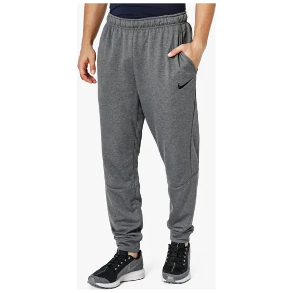 Nike Spodnie Dry Taper Fleece , szary, rozmiar L. Szare spodnie sportowe męskie Nike, l, bez wzorów, z dresówki, dri-fit (nike). W wyprzedaży za 129.99 zł.